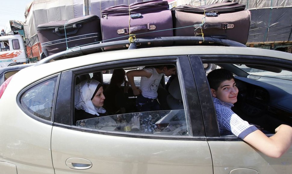 Sirijos gyventojai bėga į Libaną.