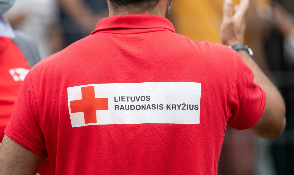 Raudonojo kryžiaus savanoriai užsieniečiais rūpinosi ir iki karo.