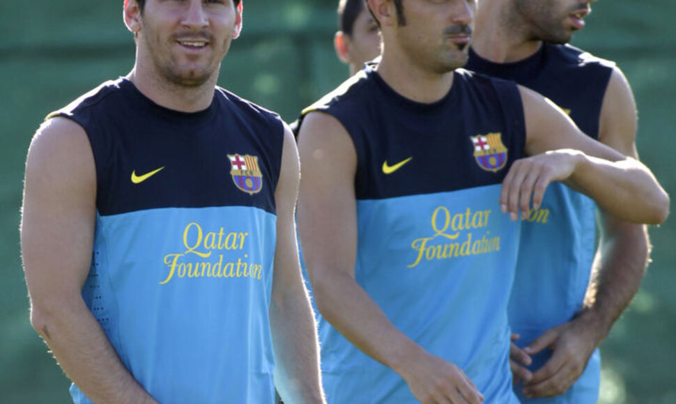 Davidas Villa su komandos draugais