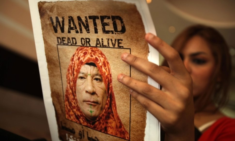 Interpolas ragina suimti Muamarą Kadhafi.