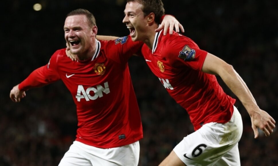 Wayne'as Rooney ir Jonny Evansas