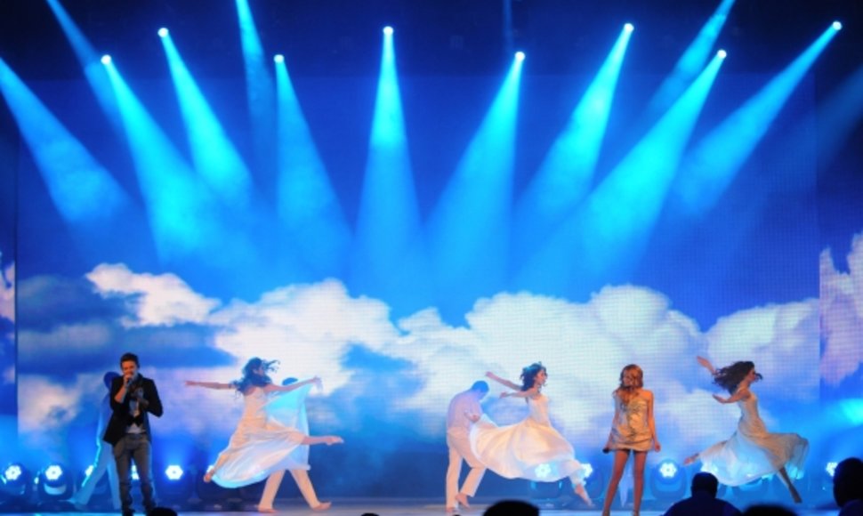 Eurovision winners El, left, and Nikki, second right, of Azerbaijan perform during the Semi-Final Allocation Draw for the 2012 Eurovision Song Contest in Baku, Azerbaijan.