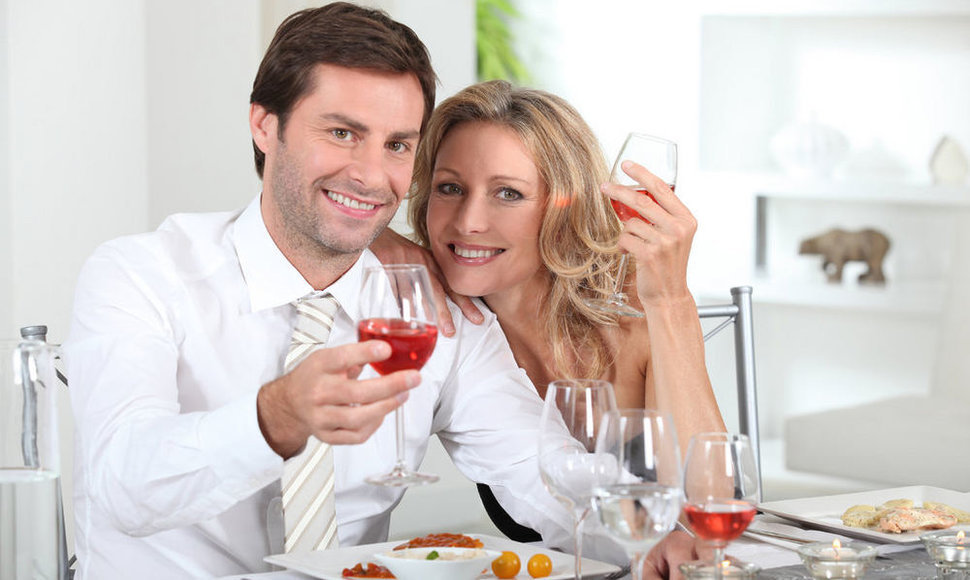 Couple eating meal at table