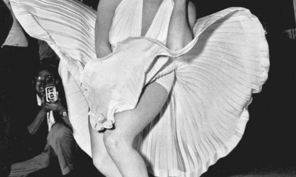 FILE - In this Sept. 9, 1954 file photo, Marilyn Monroe poses over the updraft of New York subway grating while in character for the filming of "The Seven Year Itch" in Manhattan. The former Norma Jean Baker modeled and starred in 28 movies grossing $200 million. Sensual and seductive, but with an a