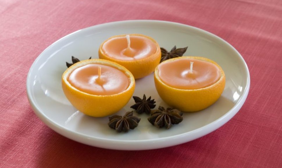 Žvakės apelsinų puselės