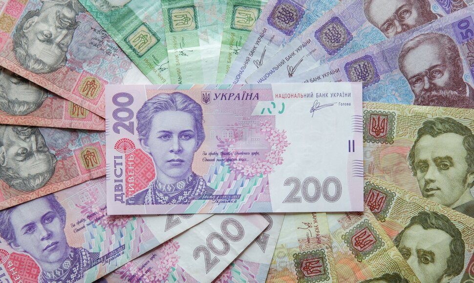Ukrainos grivinos banknotai nuotraukoje i&scaron; Kijevo. / Konstantin Chernichkin / REUTERS