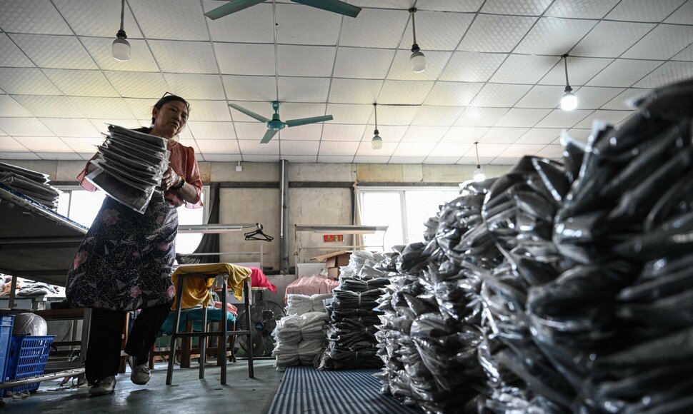 Prekės Kinijoje / JADE GAO / AFP