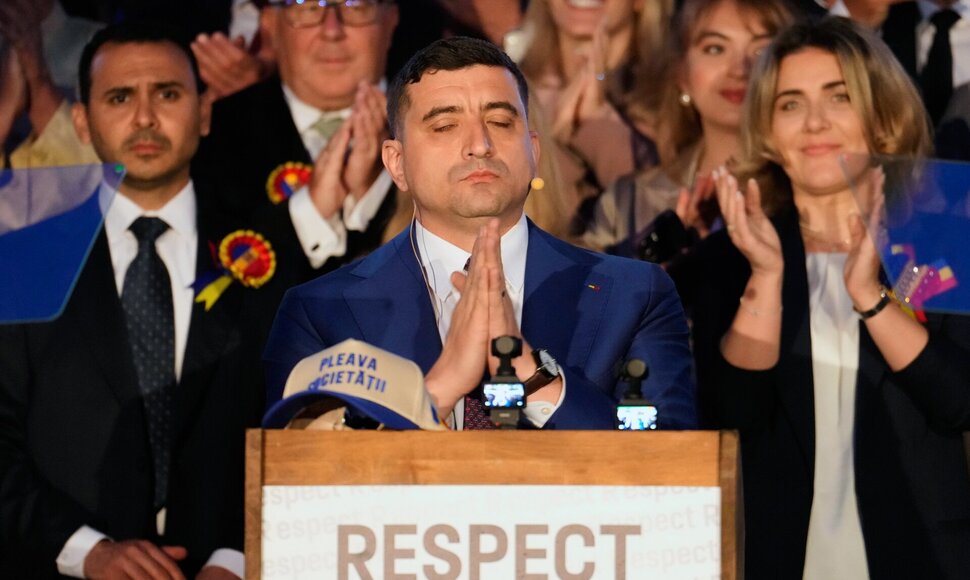 George Simionas / Vadim Ghirda / AP