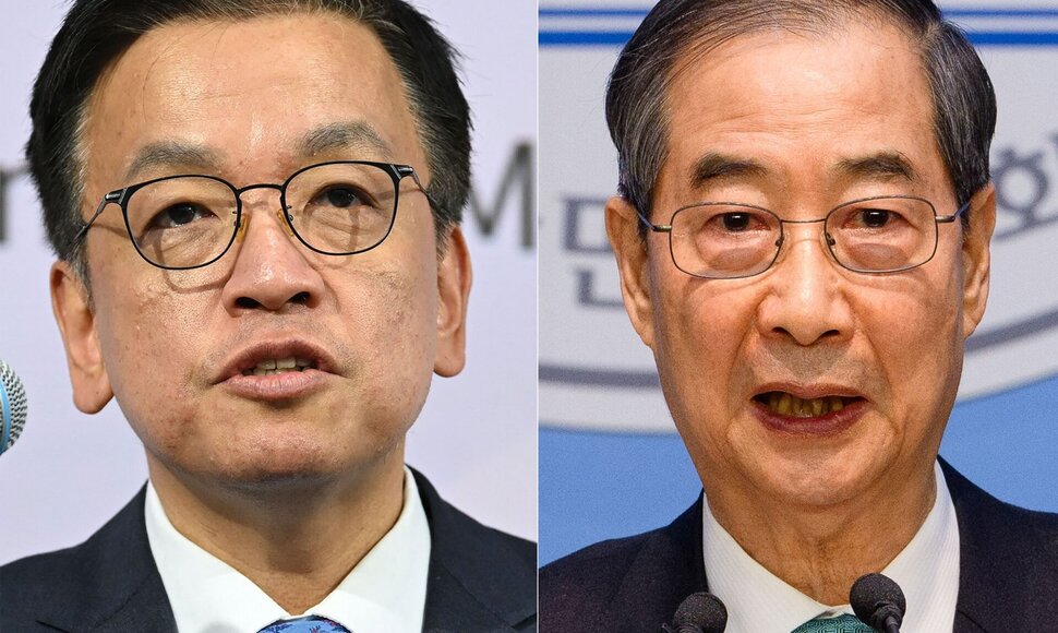 Han Duck-soo ir Choi Sang-mokas / ANTHONY WALLACE JUNG YEON-JE / AFP