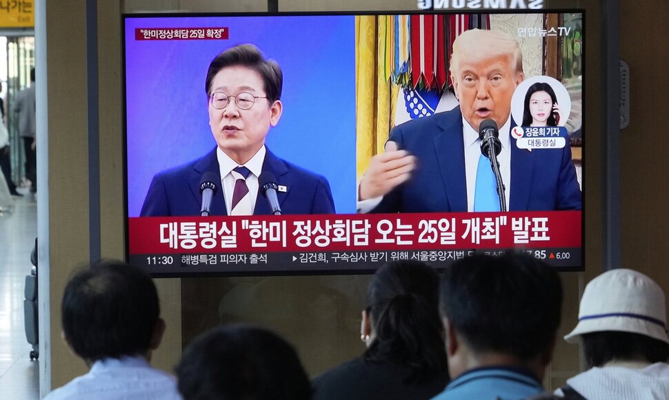 Lee Jae-myungas ir Donaldas Trumpas / Ahn Young-joon / AP