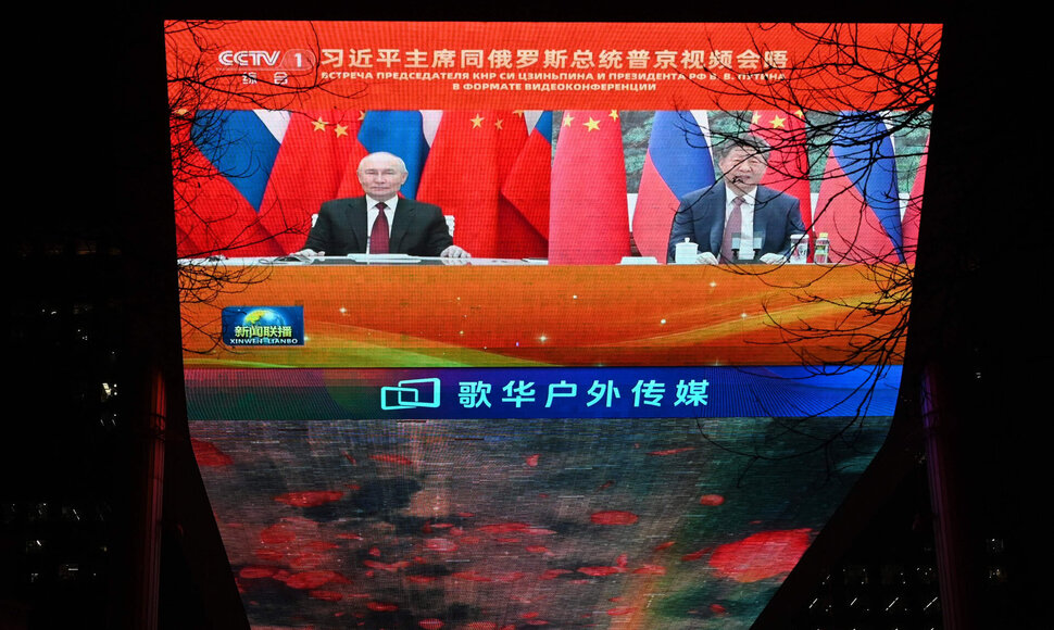 Vladimiras Putinas ir Xi Jinpingas / GREG BAKER / AFP