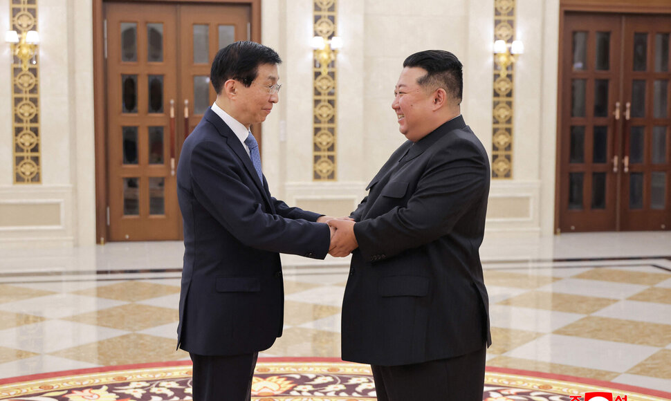 Wang Huningas / STR / AFP