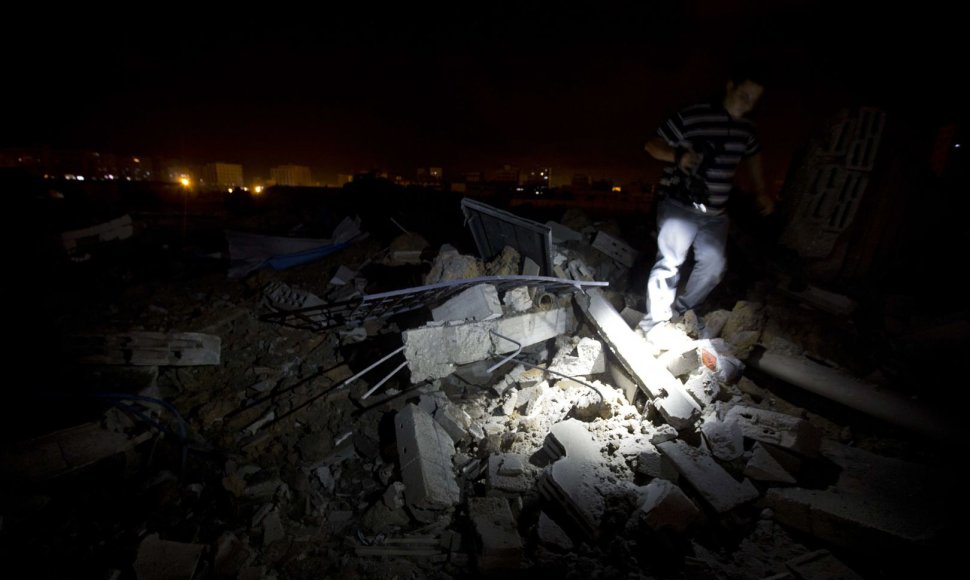 Izraelio oro atakų padariniai Gazos mieste
