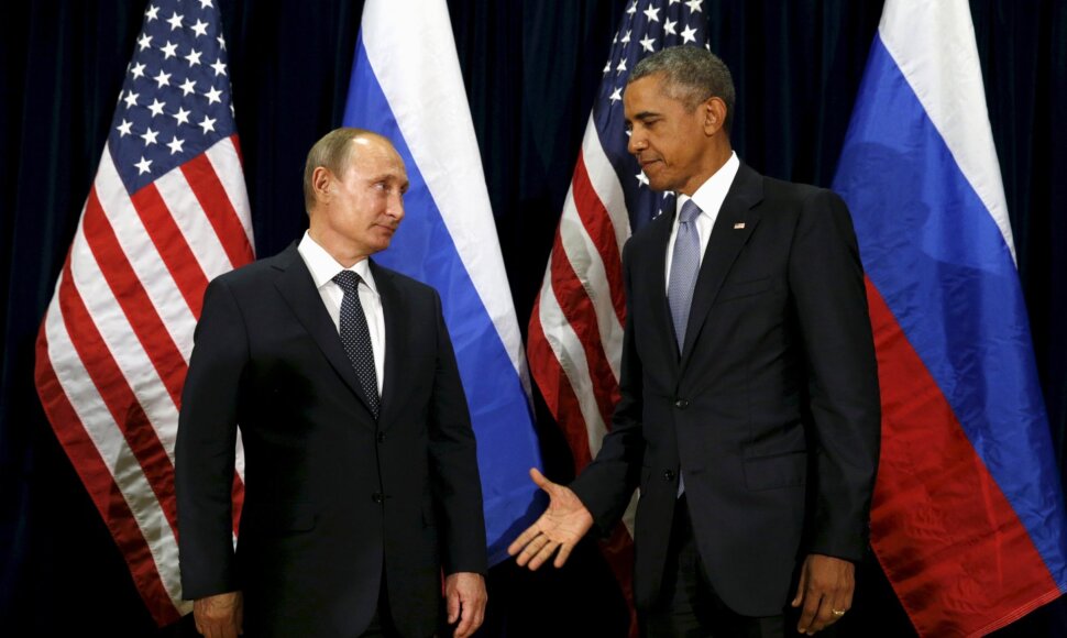 Barackas Obama ištiesia ranką Vladimirui Putinui