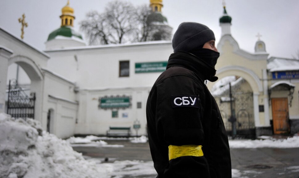 SBU pareigūnas / SERGEI CHUZAVKOV / AFP