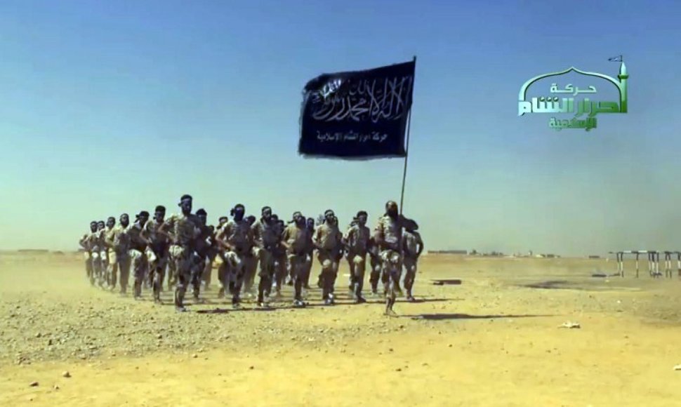 Stop kadras iš „IS“ propagandinio vaizdo įrašo