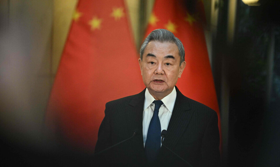 Wang Yi / ATTILA KISBENEDEK / AFP