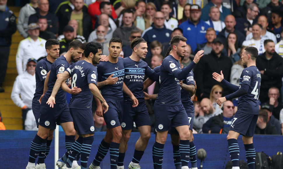 „Manchester City“ futbolininkai švenčia įvartį