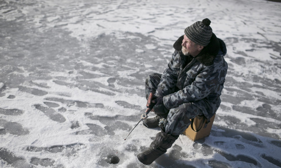 Ukrainos žvejys Azovo jūros pakrantėje