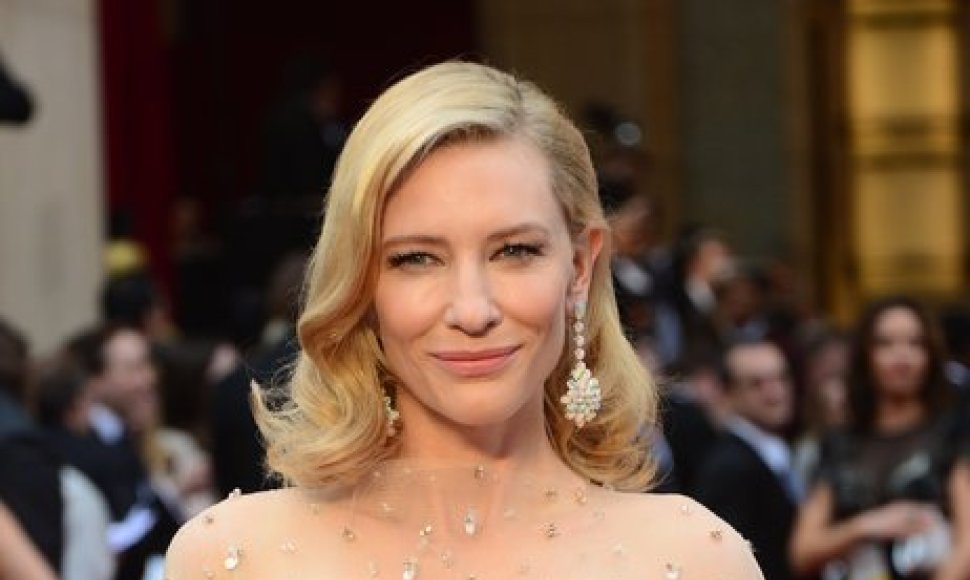 Nominee for Best Actress in "Blue Jasmine" Cate Blanchett arrives on the red carpet for the 86th Academy Awards on March 2nd, 2014 in Hollywood, California. AFP PHOTO FREDERIC J. BROWN