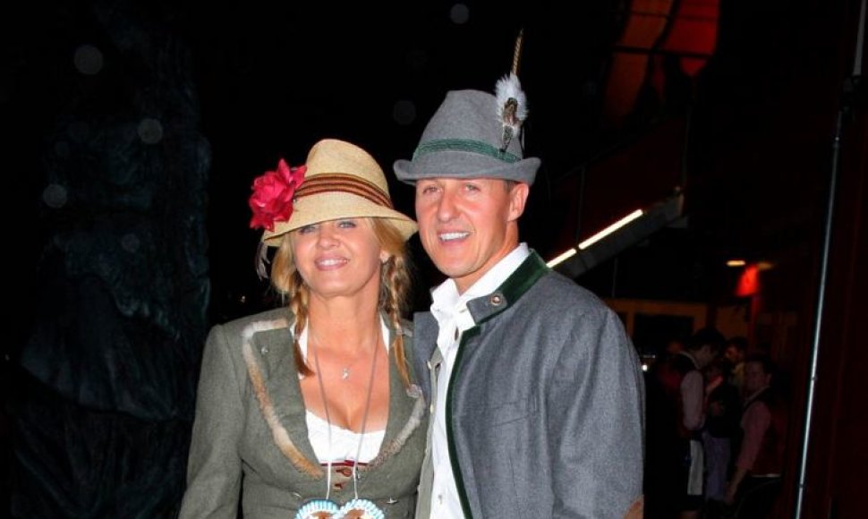 Michaelis Schumacheris su žmona Corinna 2013-ųjų spalį